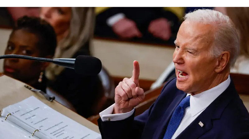 Байден АҚШ үкіметін уақытша қаржыландыру туралы заң жобасына қол қойды